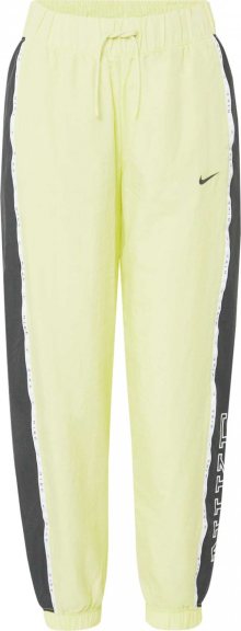Nike Sportswear Kalhoty \'Piping\' žlutá