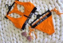 Calvin Klein Plavky Cheeky String Side Oranžové Spodní Díl M