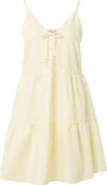 Tommy Jeans Letní šaty pastelově žlutá