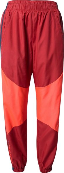 Sportovní kalhoty Under Armour chladná modrá / oranžová / tmavě červená