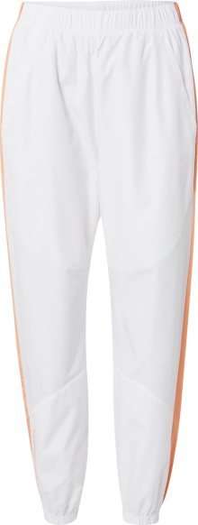 Sportovní kalhoty Under Armour oranžová / bílá