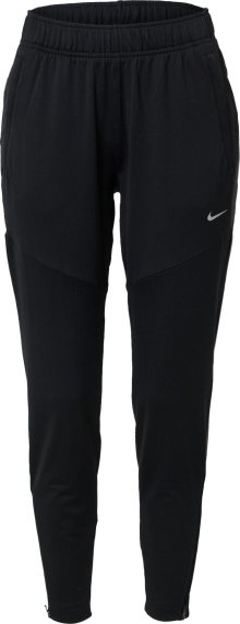 Sportovní kalhoty Nike světle šedá / černá